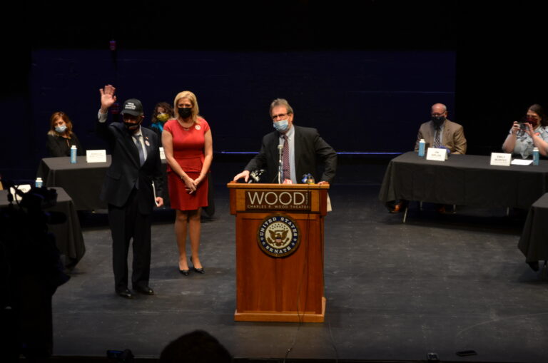 Senator Schumer on stage with Chairwoman Rachel Seeber and Mayor Dan Hall