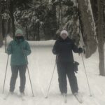 Two skiers looking at camera at Cole's Woods