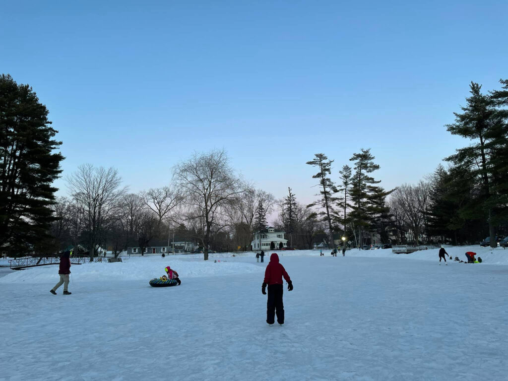 People ice skating on Crandall Pond